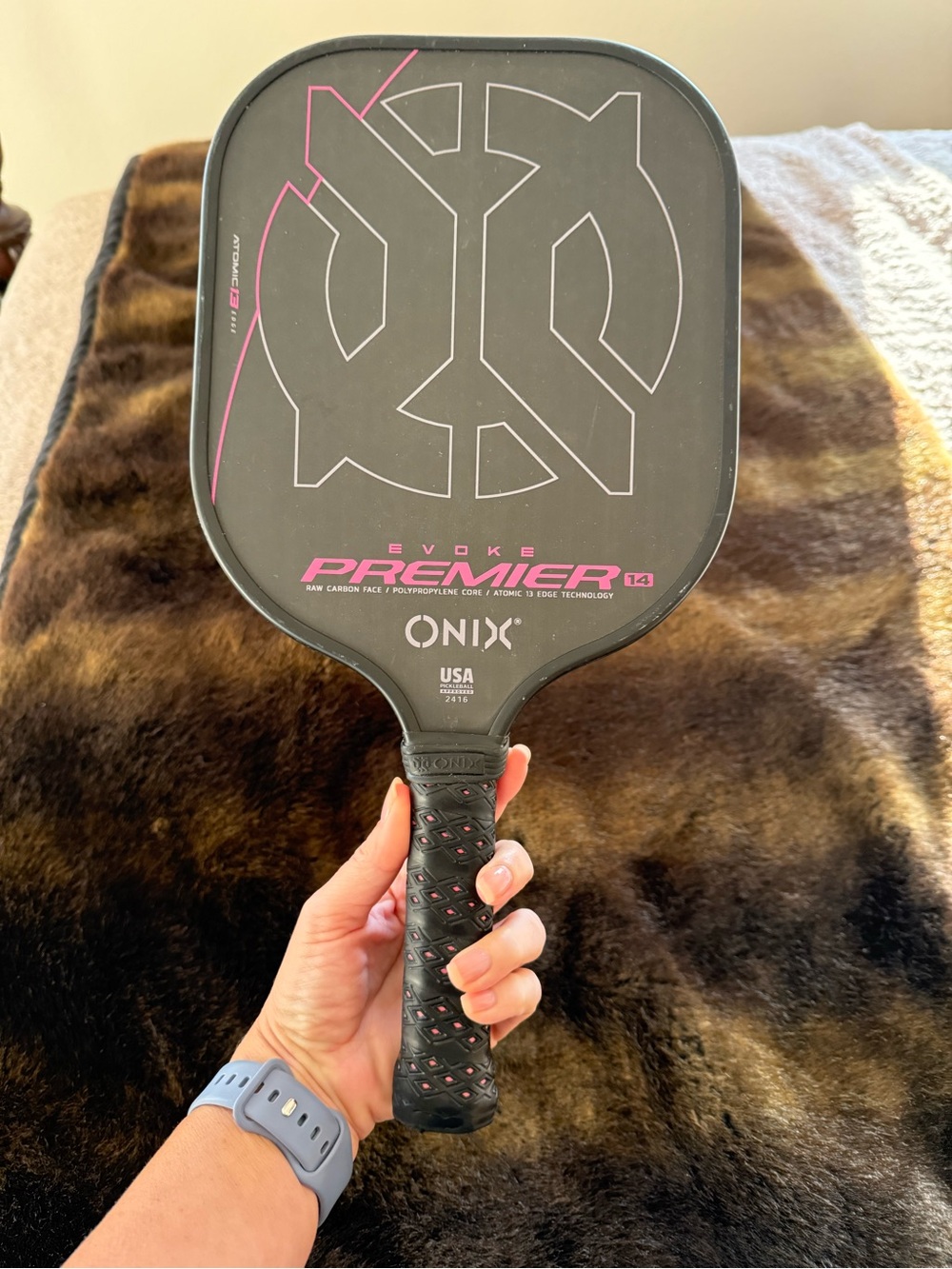 ONIX Evoke Premier Pickleball Paddle in Black with Pink Accents